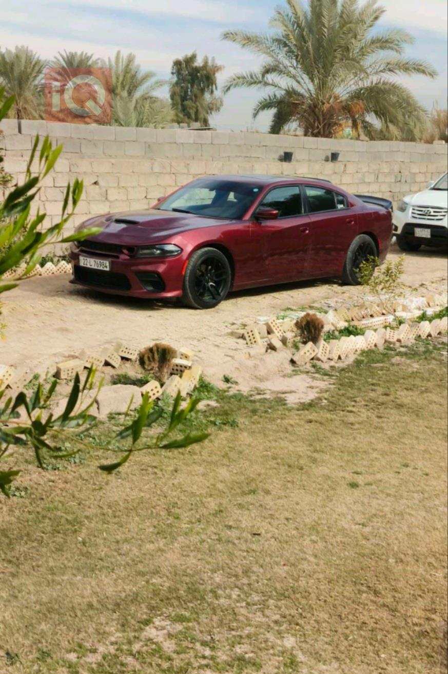 دۆج چارجەر